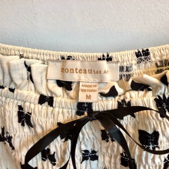 Cream Ruffled Off-Shoulder Dress with Black Bow Design - Picture 2 of 7